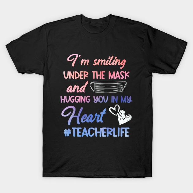 I Am Smiling Under The Mask Hugging You In My Heart Teacher Shirt - Trending Social Distancing Teacher Shirt - Distance Learning T-Shirt by RRADesign